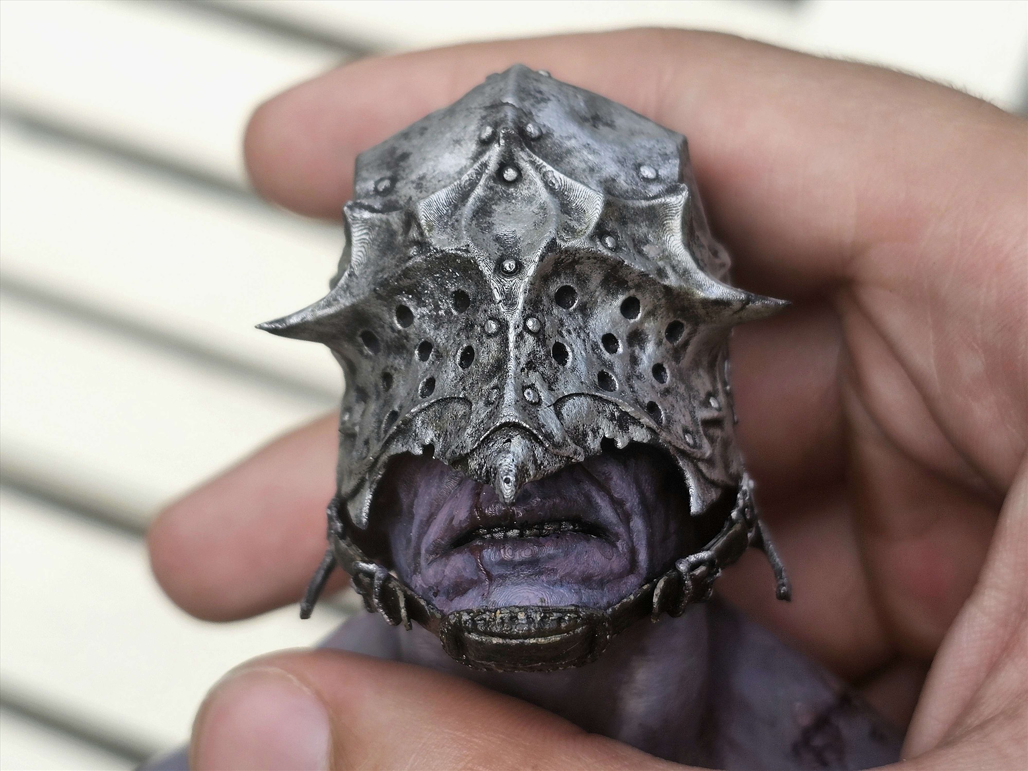 Sallet Man miniature held in hand